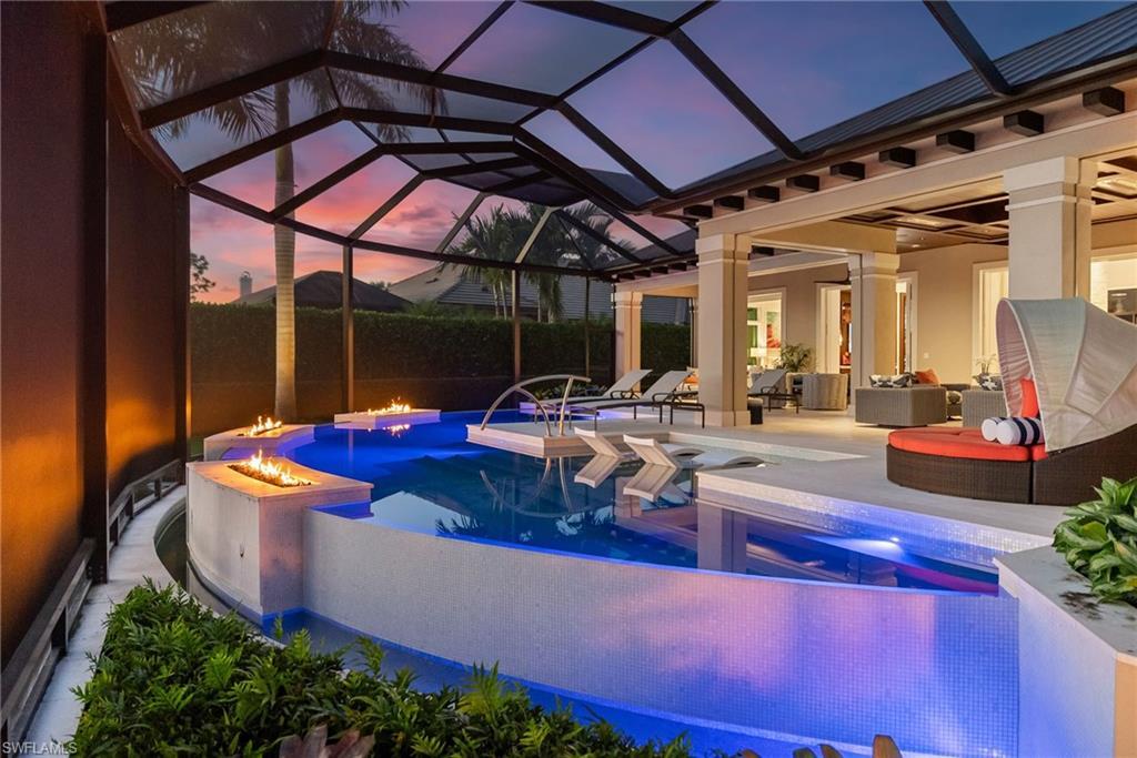 Image 1: Twilight pool & fire columns