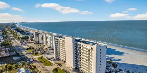 Image 2: The Ambassador located at 26300 Hickory Blvd.  Each unit faces both bay and gulf, unique along Bonita Beach.