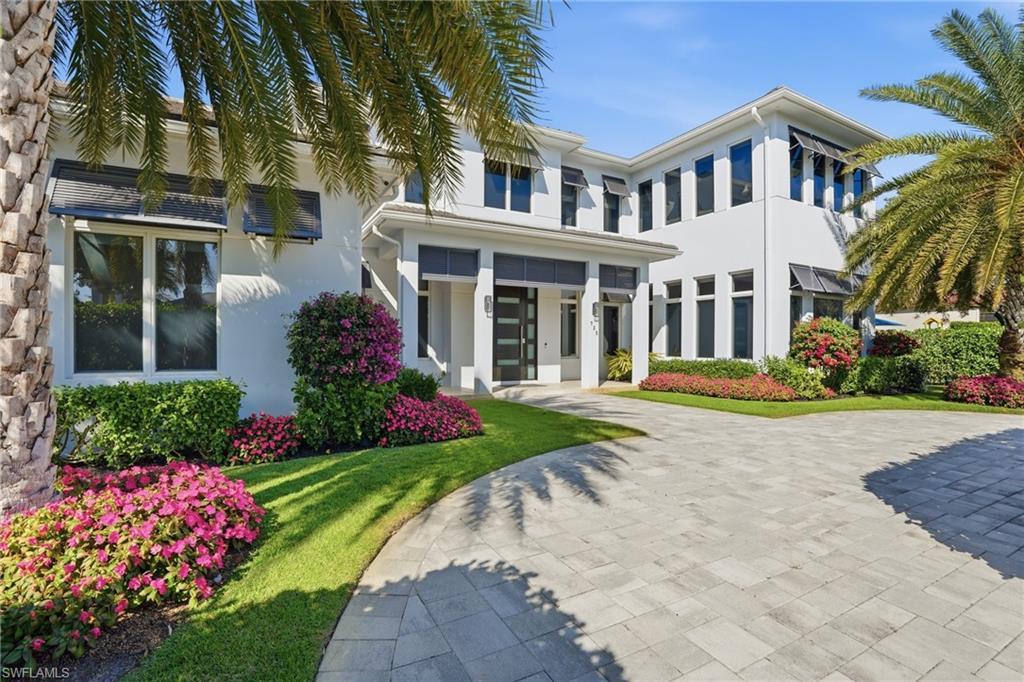 Image 3: Beautiful home with an abundance of natural light from all the windows.
