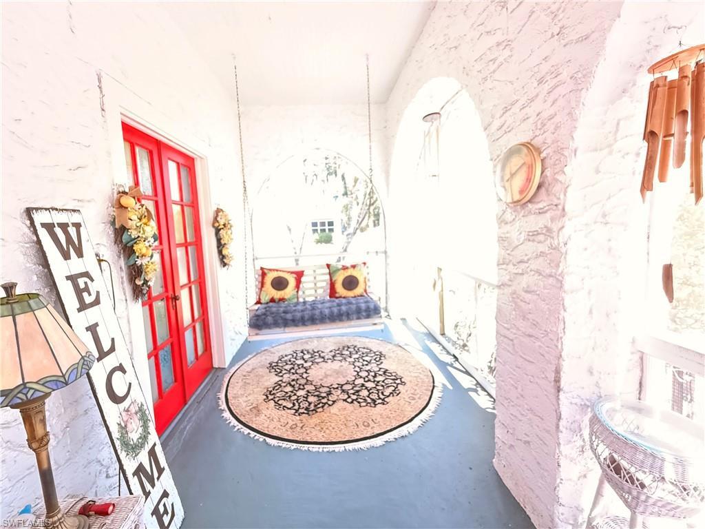 Image 3: Entrance to property with french doors