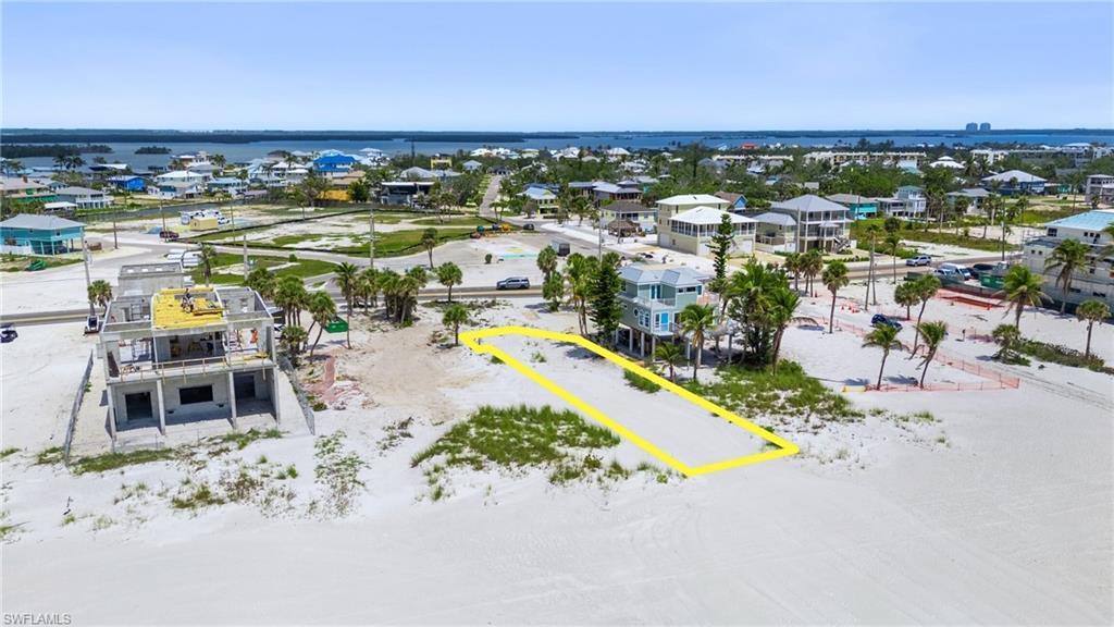 Image 2: Drone / aerial view with a residential view and a water view  - Virtually Edited Image