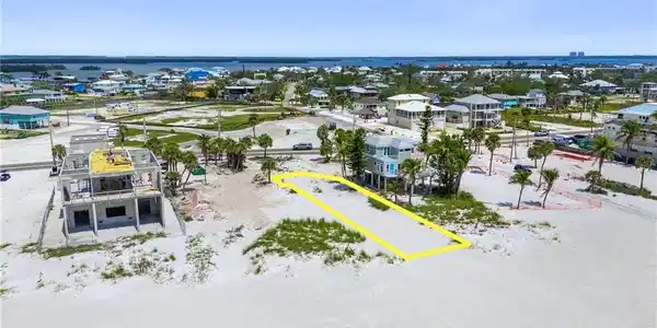 Image 2: Drone / aerial view with a residential view and a water view  - Virtually Edited Image