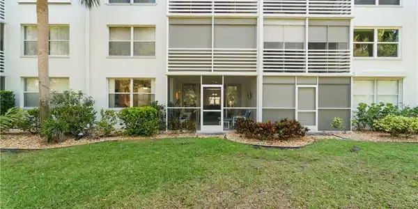 Image 2: Private yard off your screened lanai.