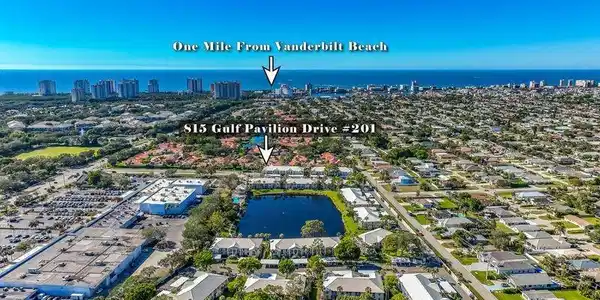Image 2: Aerial view of unit building and location in relation to Vanderbilt Beach