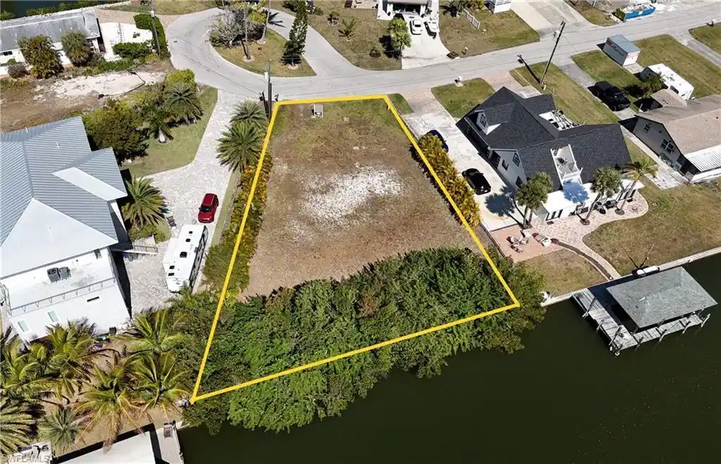Image 1: Aerial perspective of suburban area with property boundaries highlighted