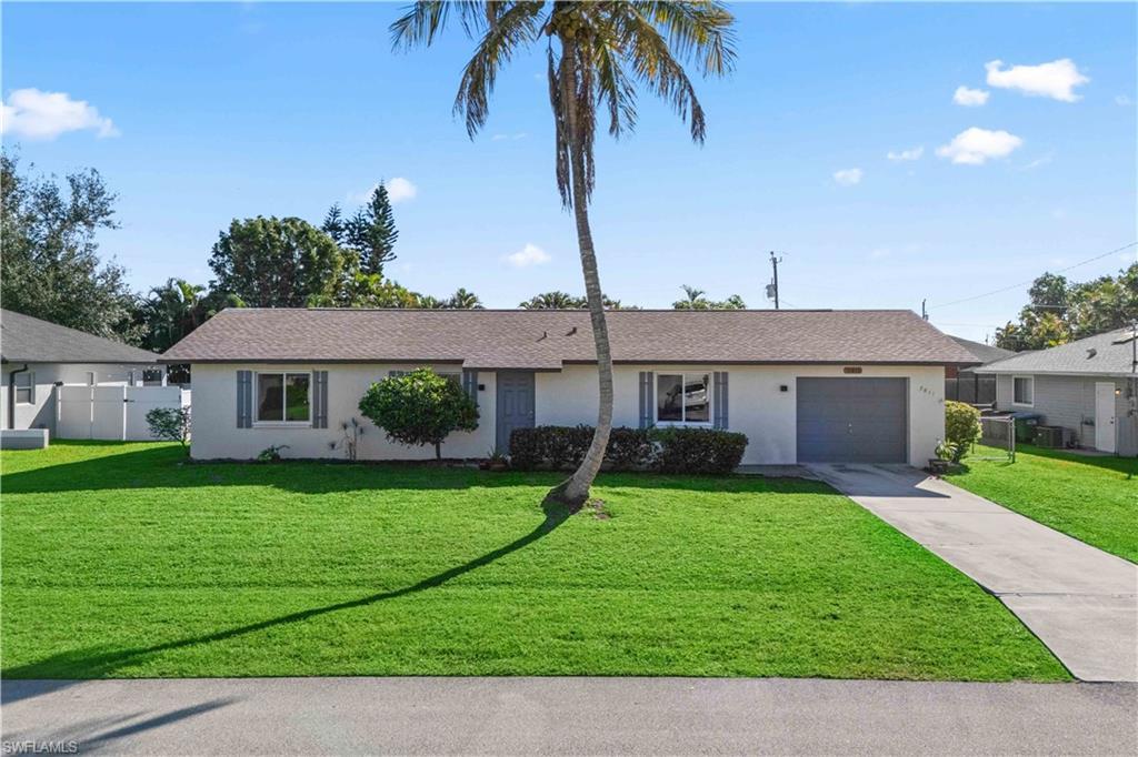 Image 3: Single story home featuring stucco siding, concrete driveway, and a garage