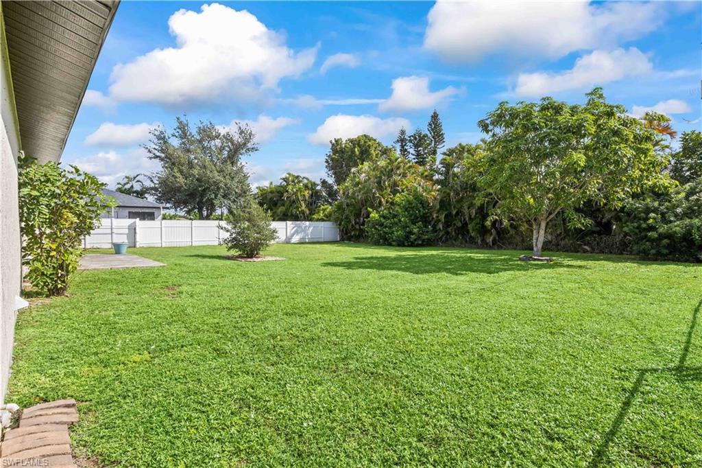 Image 4: View of fenced backyard