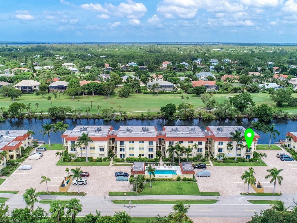 Image 2: Drone / aerial view of a golf club and a large body of water