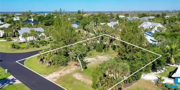 Image 2: Aerial view of residential area featuring property boundaries highlighted