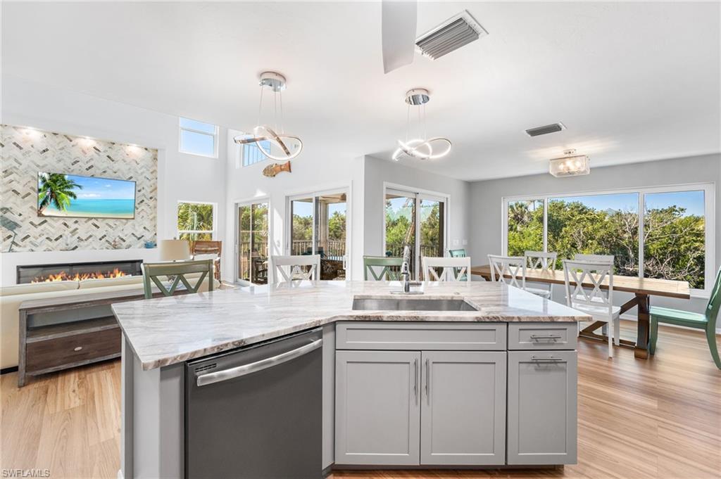 Image 2: A beautifully updated kitchen designed for everyday ease and effortless entertaining.