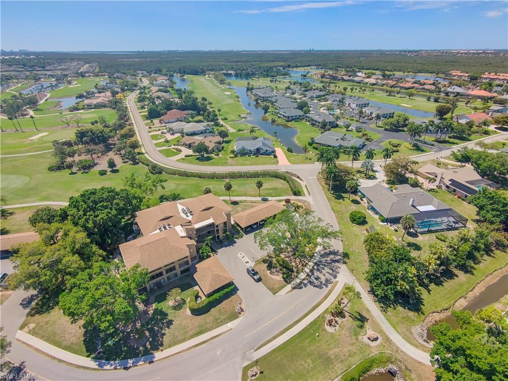 Image 1: View of property location featuring nearby suburban area and a nearby body of water