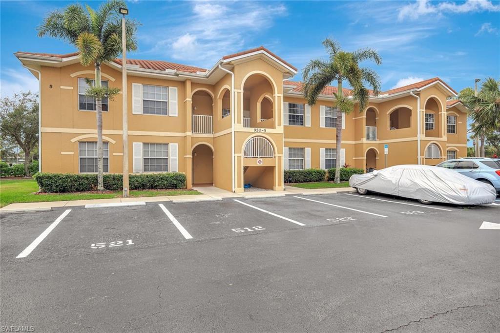Image 2: View of property featuring uncovered parking