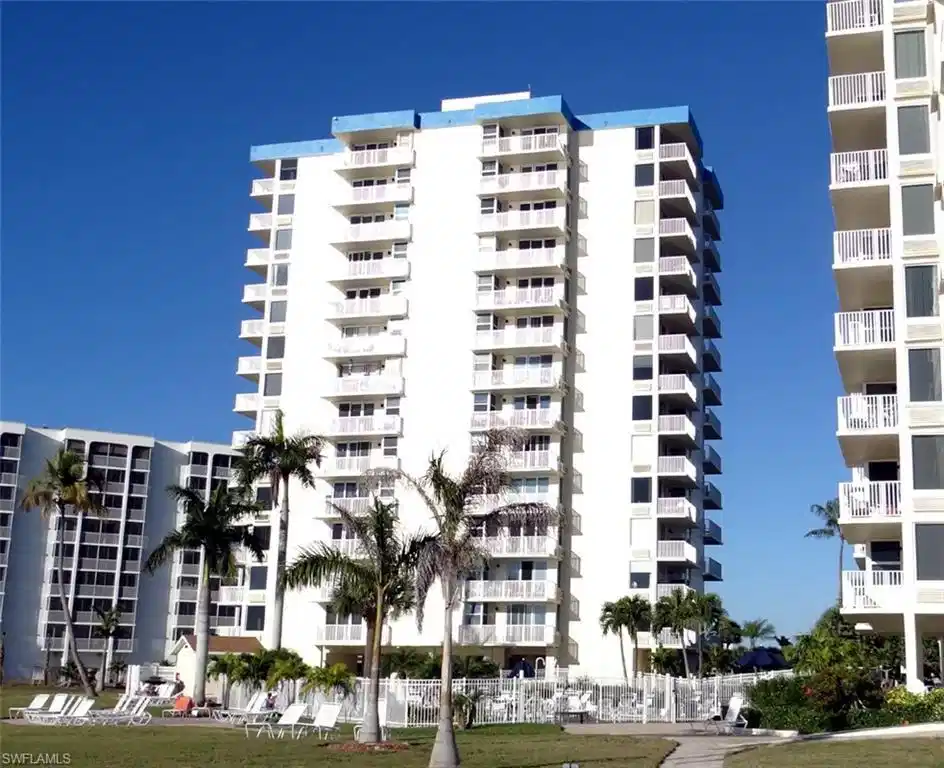 Image 1: View of apartment building / complex