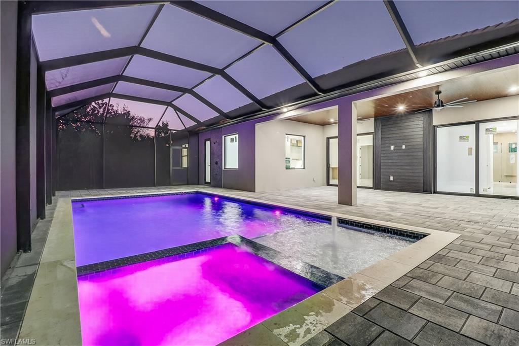 Image 3: Relaxing pool / spa , a patio, and a lanai