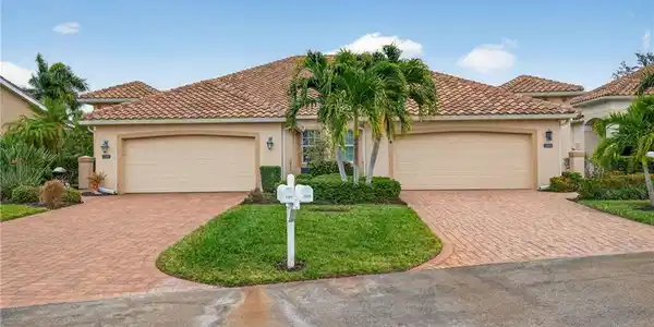 Image 3: Mediterranean / spanish house featuring stucco siding, decorative driveway, and a garage