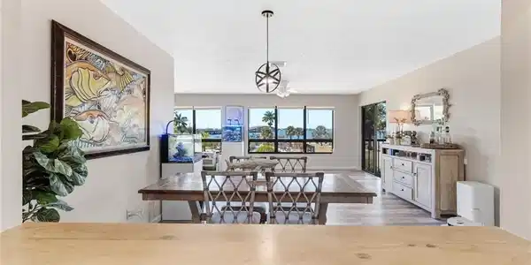 Image 3: An open flow between the living and dining areas makes entertaining feel effortless.