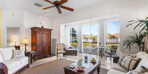 Image 3: Light and bright views to lake. Tommy Bahama easy living lifestyle furnishings included.