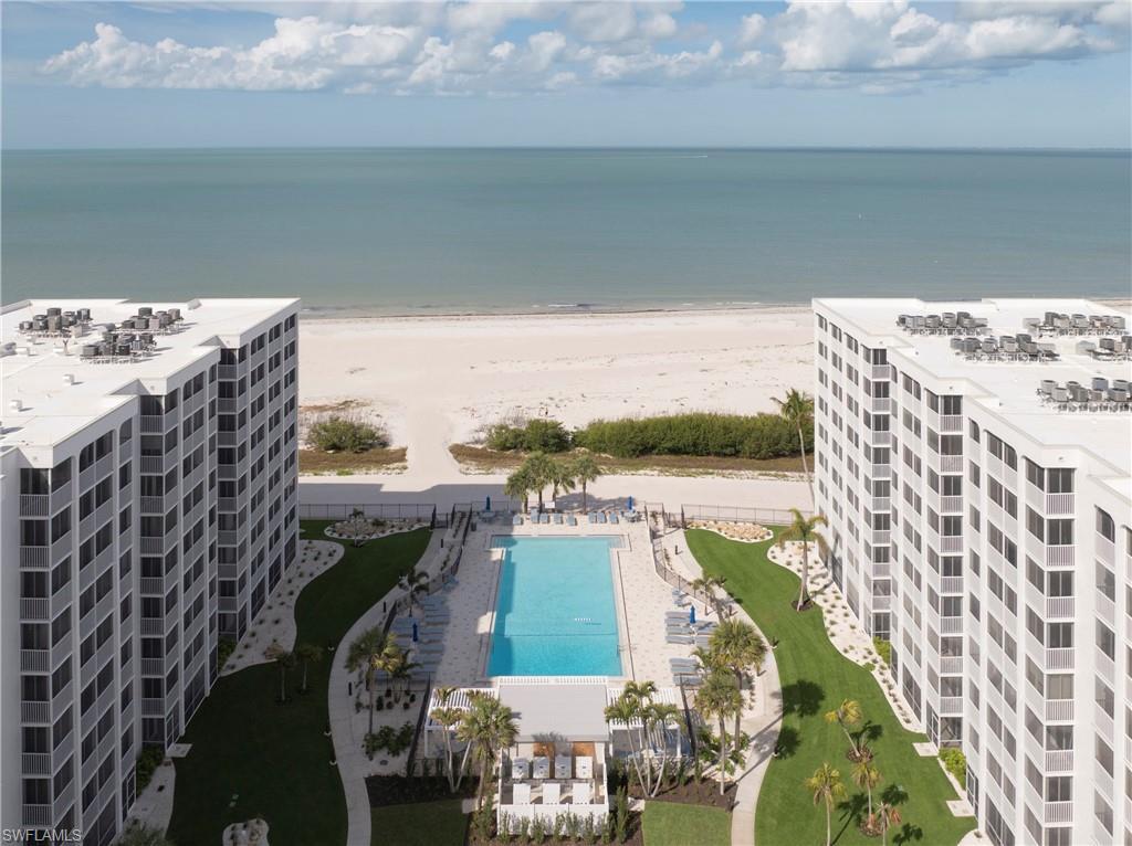 Image 1: Drone / aerial view of a pool and unending shoreline