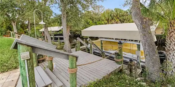 Image 4: Waterfront dock featuring durable composite decking and integrated rope railings