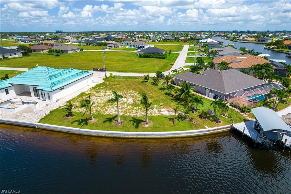 Image 1: OVERSIZE SOUTHERN rear Exposure Gulf Access lot with NEW (12/2021) 121' SEAWALL - BIG WATER VIEWS