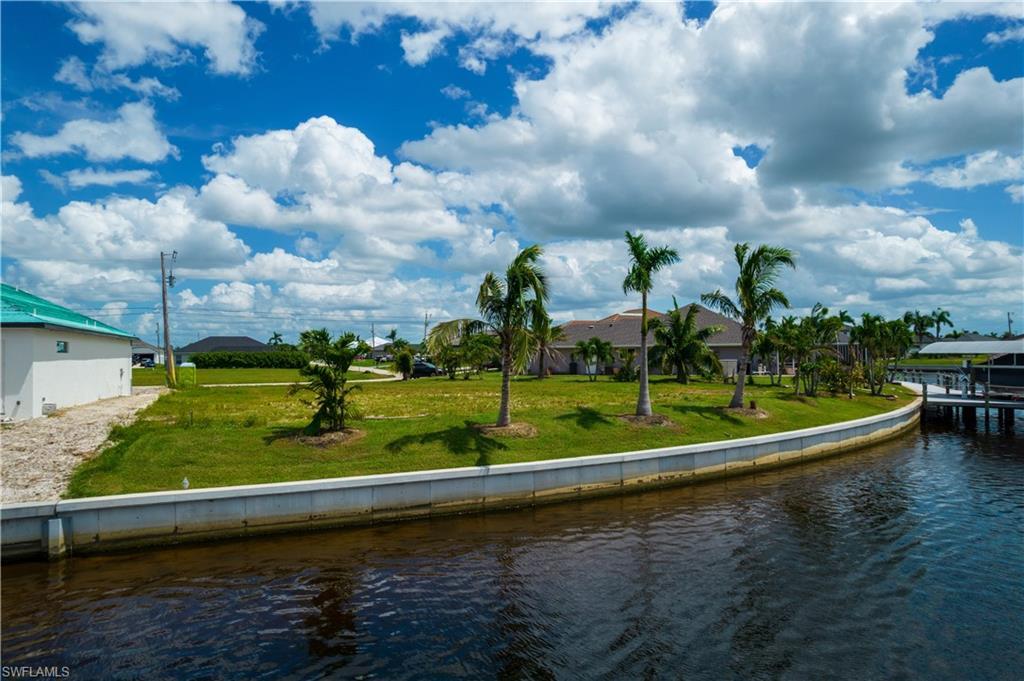 Image 2: OVERSIZE SOUTHERN rear Exposure Gulf Access lot with NEW (12/2021) 121' SEAWALL - BIG WATER VIEWS