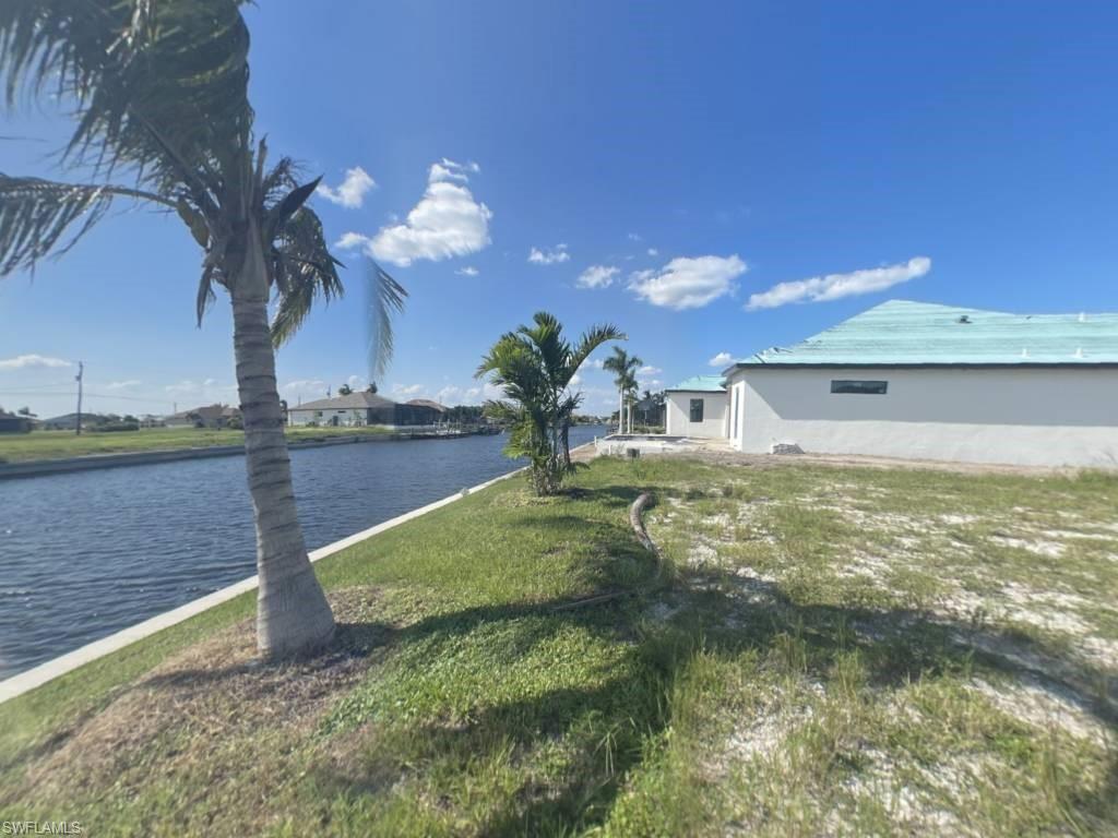Image 4: Right Side from middle of seawall on OVERSIZE SOUTHERN rear Exposure Gulf Access lot with NEW (12/2021) 121' SEAWALL - BIG WATER VIEWS