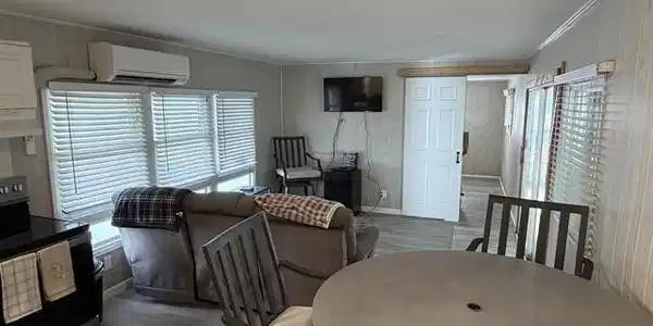 Image 3: Living Room and Dining Area