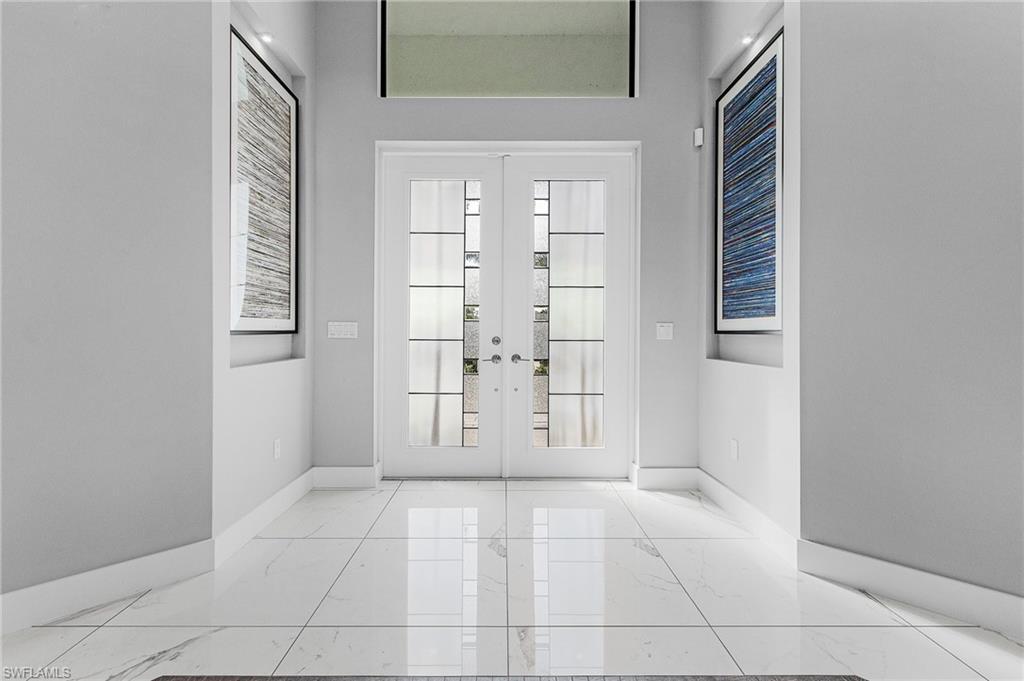 Image 4: Entryway featuring french doors