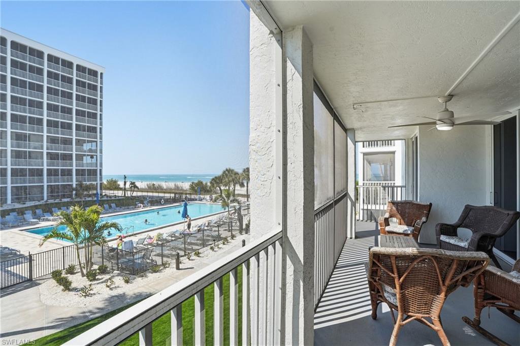 Image 2: Private balcony featuring a ceiling fan and textured concrete flooring