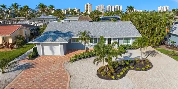 Image 3: View of front of property featuring a garage