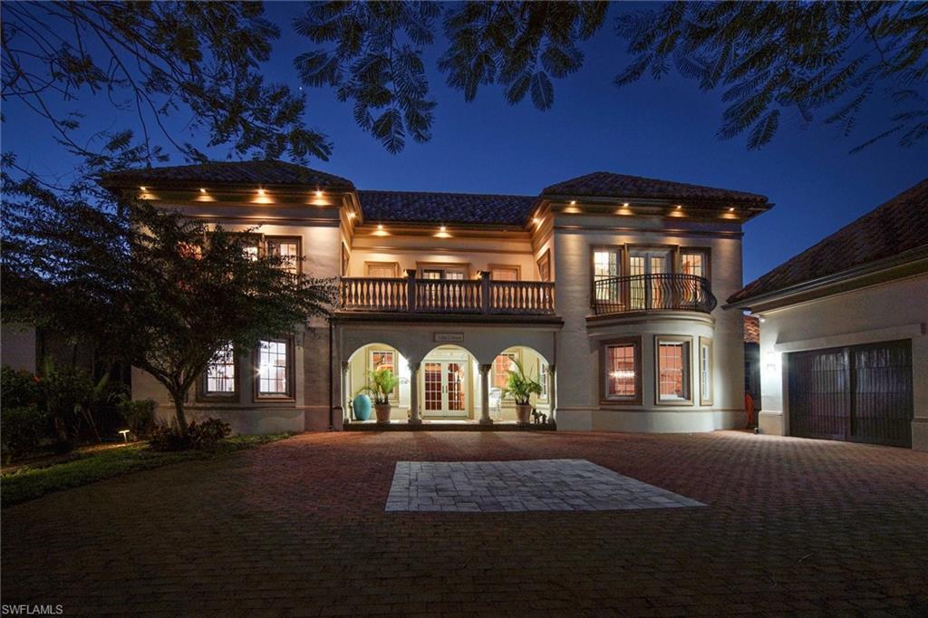 Image 3: Simply magnificent curb appeal even more stunning at dusk (before NEWLY PAVERED DRIVEWAY)