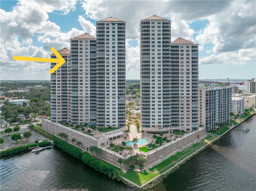 Image 1: View of property featuring a water view
