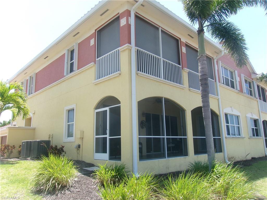 Image 2: View of building exterior featuring central AC unit
