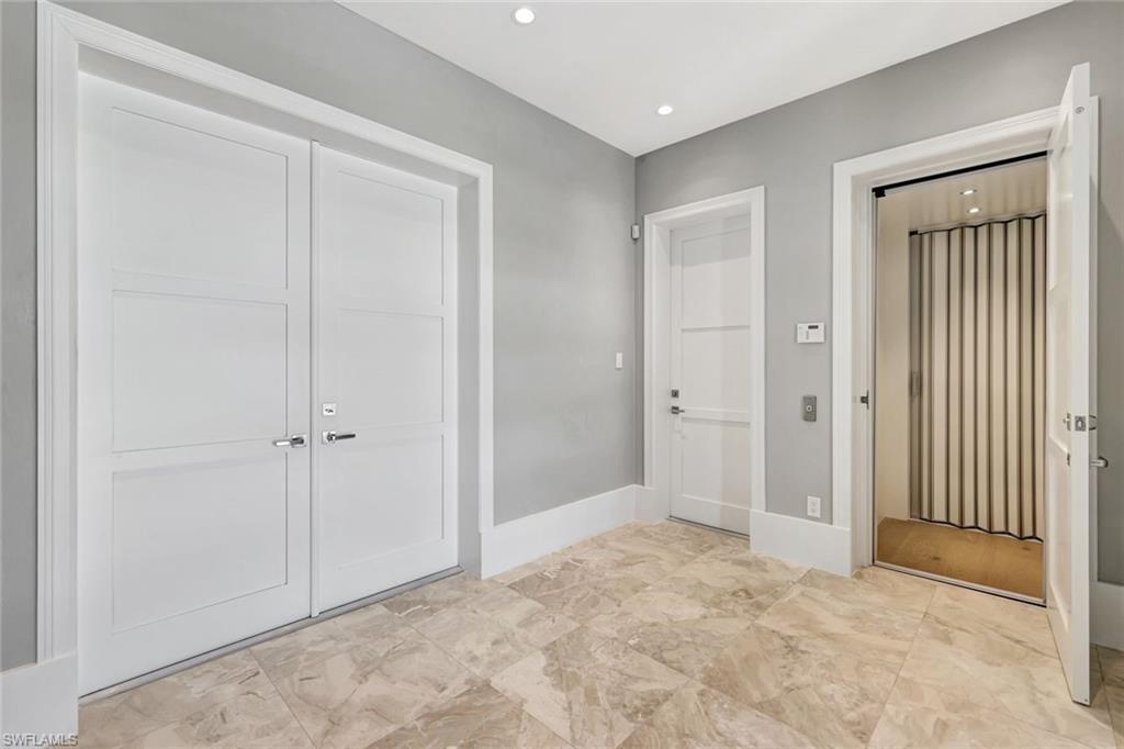 Image 4: Front entry with elevator  ground level