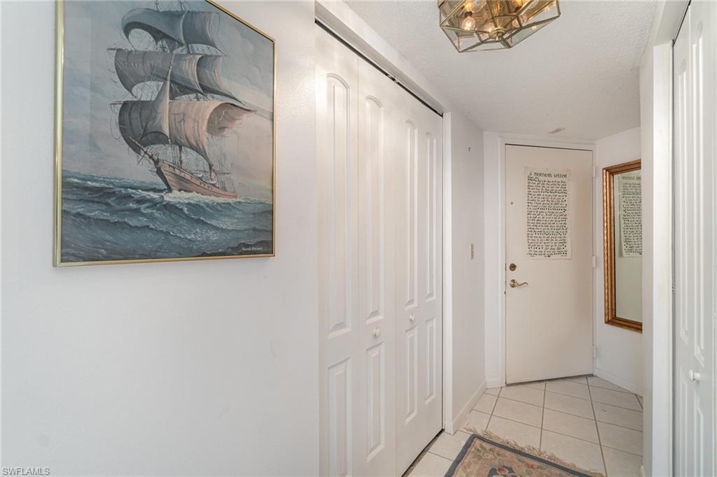 Image 4: Foyer is cleverly configured to include utility and storage closets