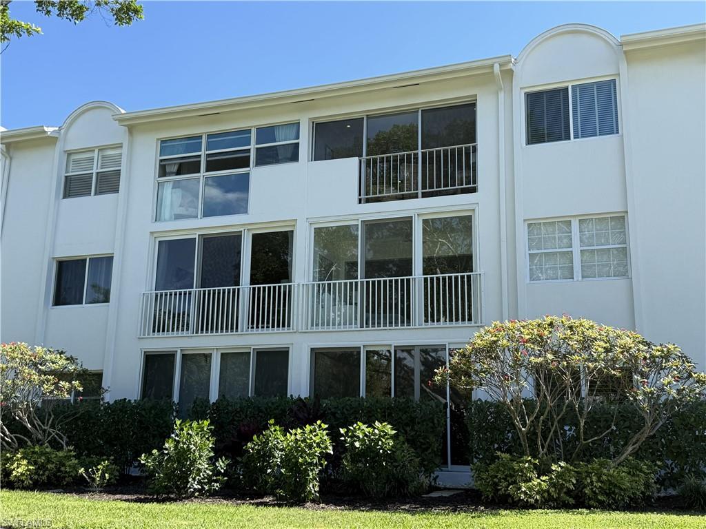 Image 1: View of apartment building / complex