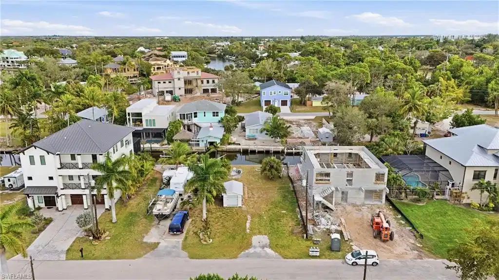 Image 1: Aerial perspective of suburban area