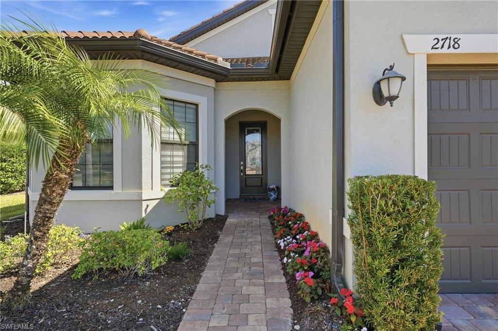 Image 3: Welcoming entry with clean architectural lines and updated curb appeal