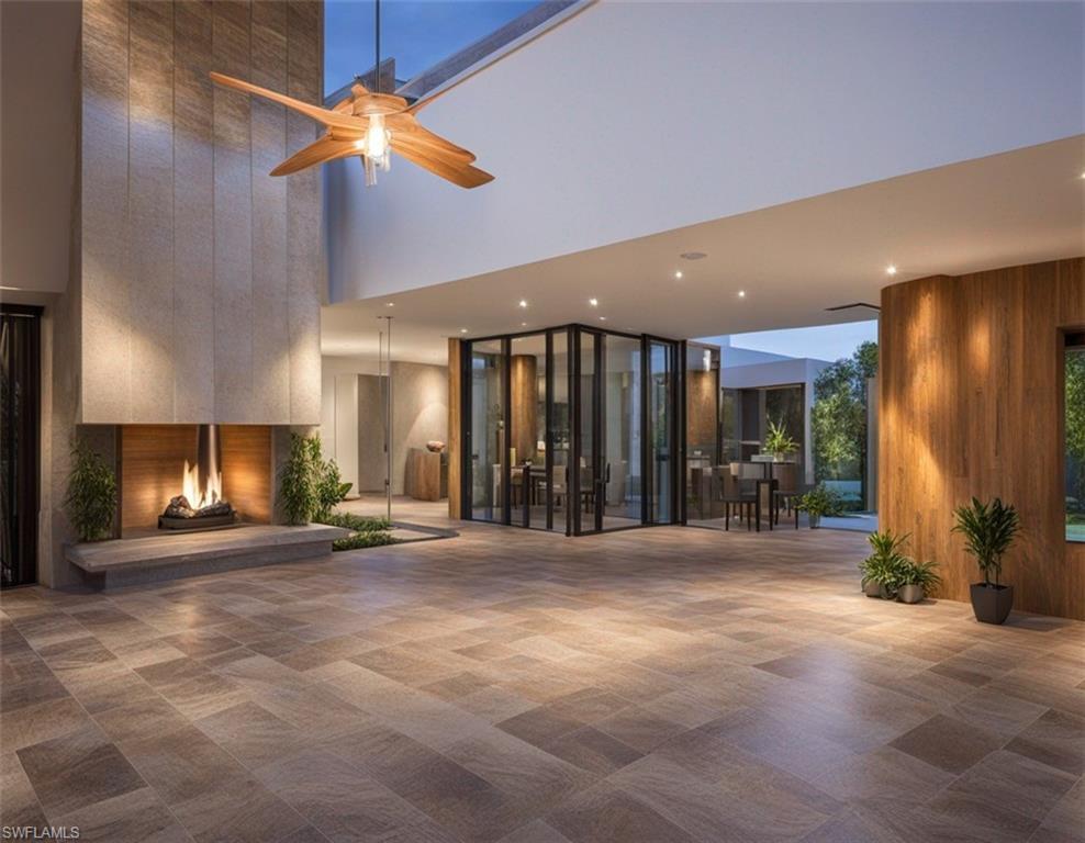 Image 4: Digital RenderingCommunity lobby featuring wood walls and a high ceiling