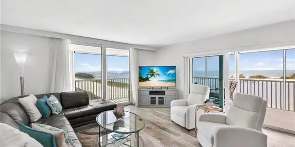 Image 4: Amazing open living area and the wrap around lanai -image may have been digitally enhanced