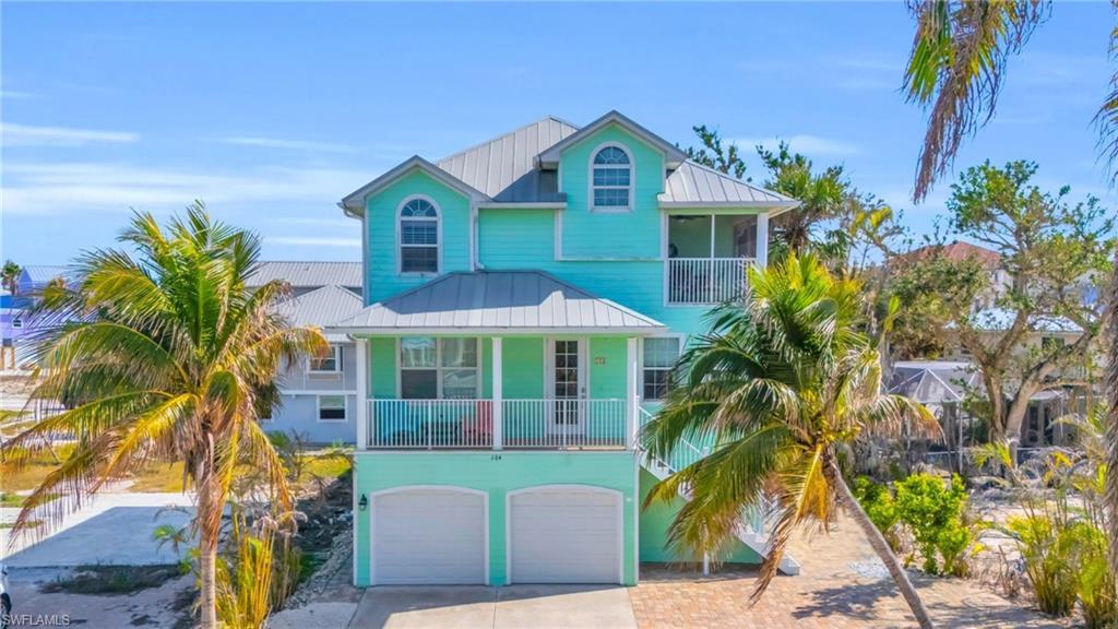 Image 2: Beach home with a garage(Photo may be virtually enhanced)
