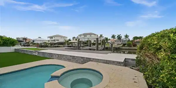 Image 3: pool, boat dock, and putting green