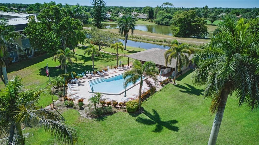 Image 1: AERIAL VIEWS OF COMMUNITY POOL AND PEACEFUL WATER AND GOLF COURSE...