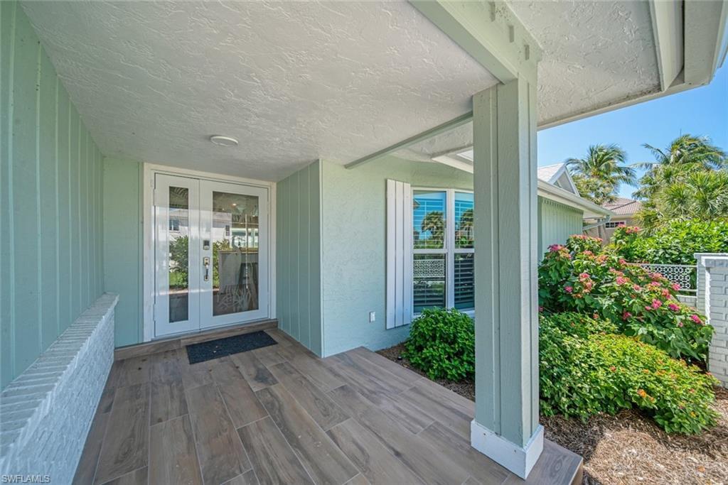 Image 3: Entrance to property with french doors
