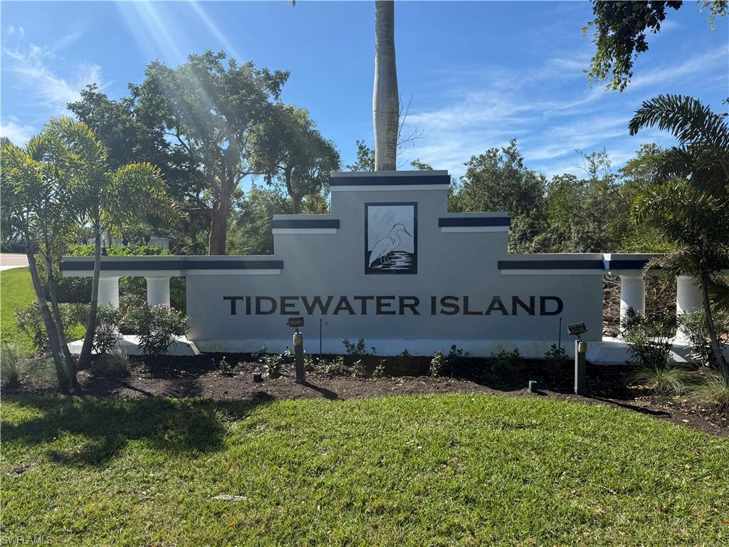 Image 1: Community sign with a yard