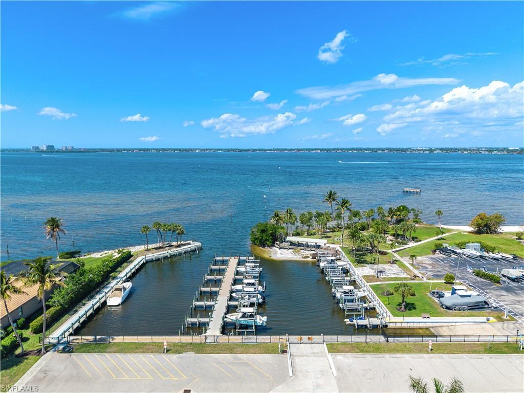 Image 2: Drone / aerial view of a nearby body of water and numerous boat docks