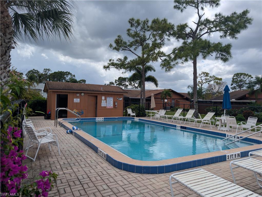 Image 1: Pool directly across from unit.