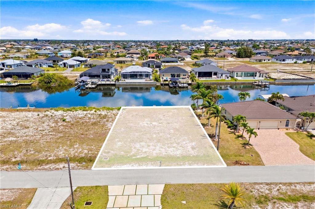 Image 2: Expansive cleared lot with defined boundaries