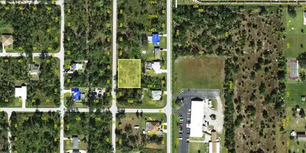 Image 2: Aerial Property Survey. Highlighting the parcel boundary and surrounding land use