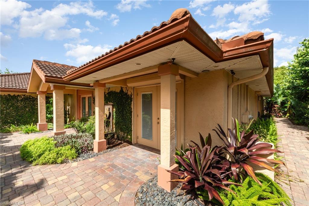 Image 4: View of front of home with a patio